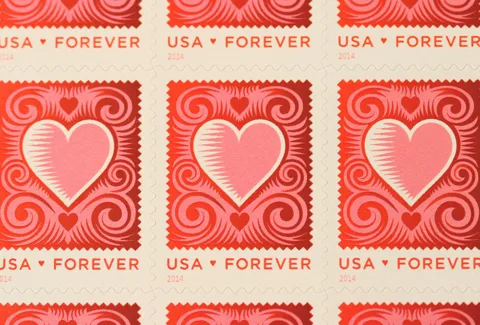 forever postage stamps cover the current postage rate